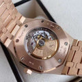55 Audemars Piguet rose gold with white dial, automatic mechanical transparent back, 41mm case diameter, 18k rose gold case