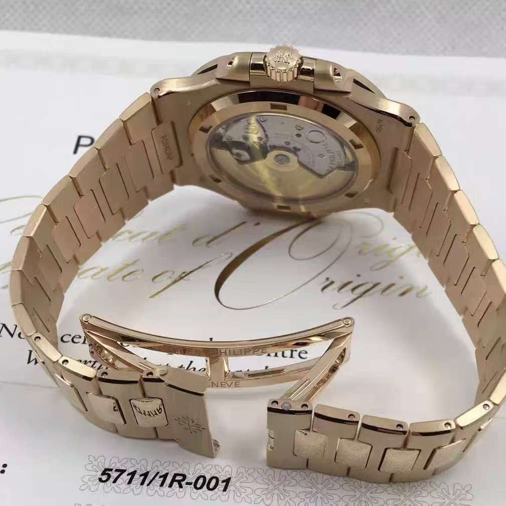 59 Patek Philippe All-Gold Nautilus Sporty Elegant Watch